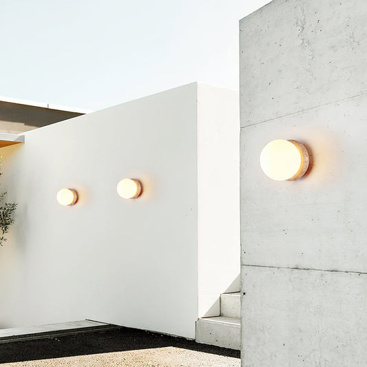 Caliror Round-plate Travertine Wall Light