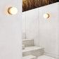 Caliror Round-plate Travertine Wall Light