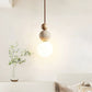 Ullaeia Sphere-cluster Travertine Pendant Light