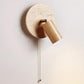 Evzoryra Disc Swing Travertine Wall Light