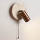 Evzoryra Disc Swing Travertine Wall Light